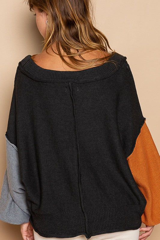 The Hand-Woven Exposed Seam Roll Edge Color Block V Neck Sweater