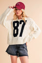 The Modern Weaver Contrast Number Cable Knit Drop Shoulder Sweater